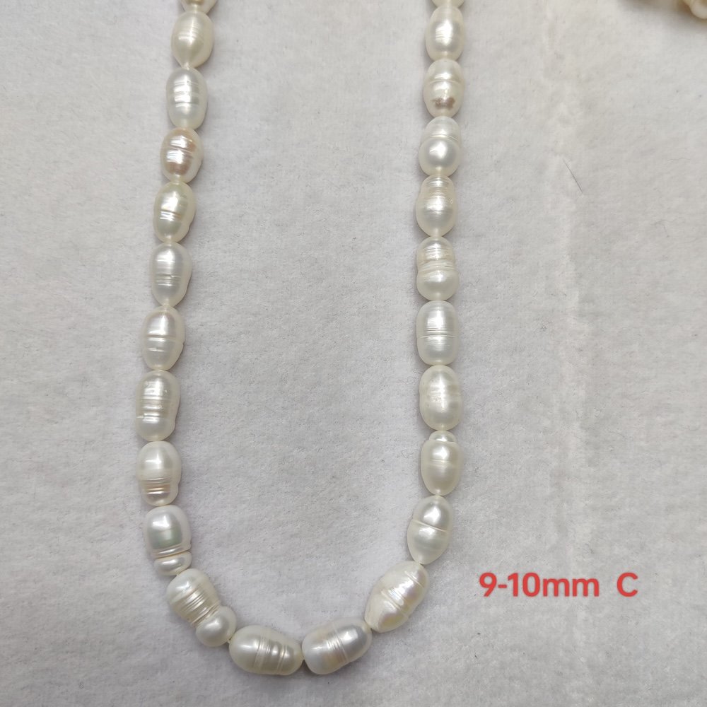 9-10mm white rice shaped freshwater pearl strand, C Grade, 16 inches